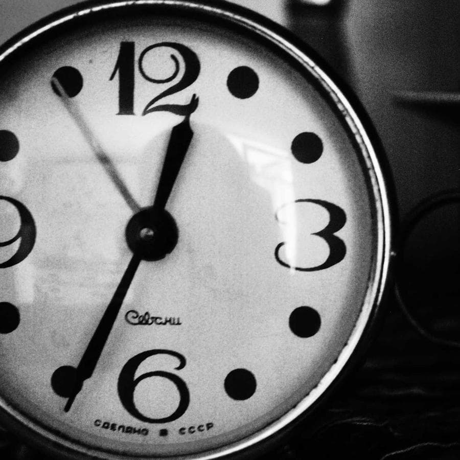 A black and white wall clock