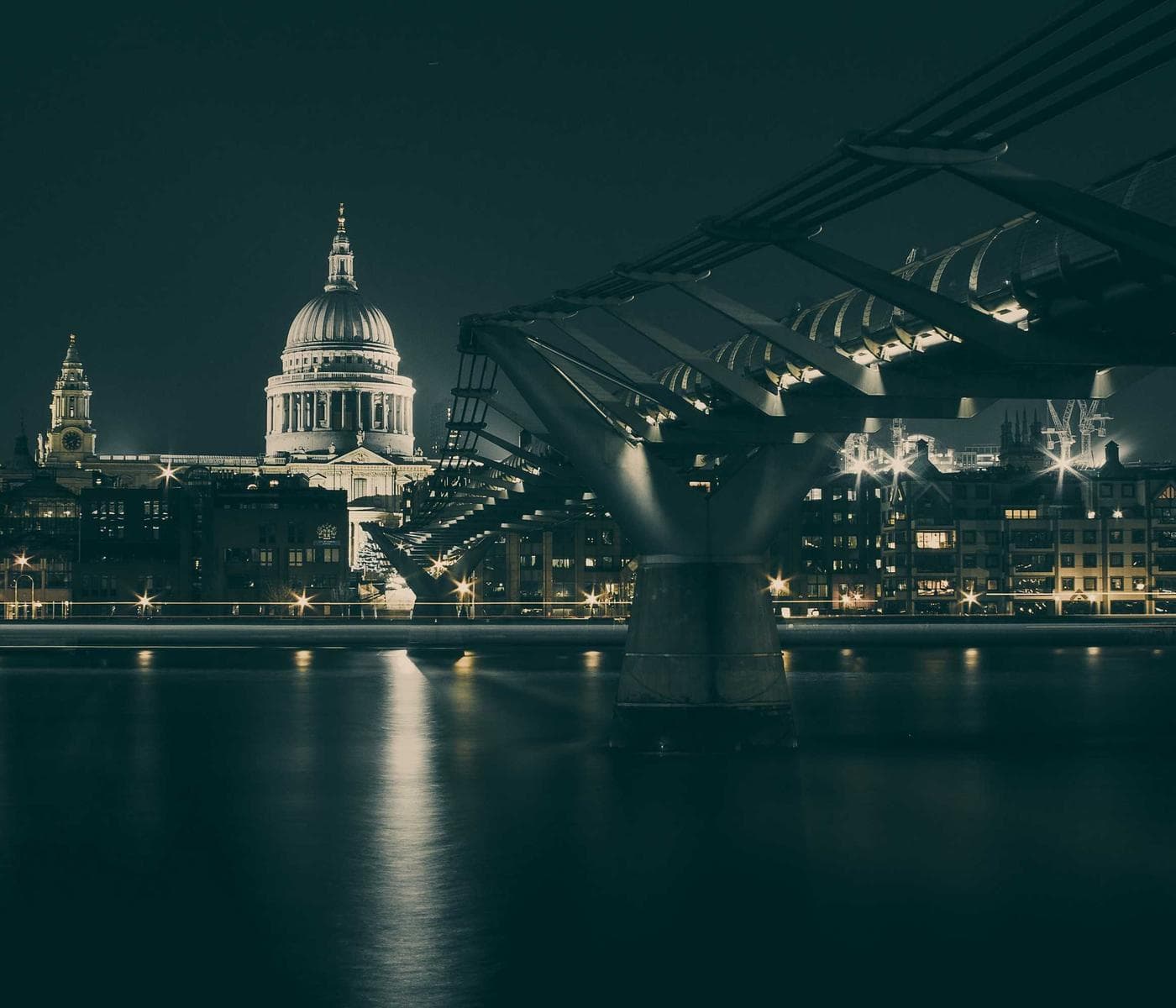 City lights reflected on a river at night