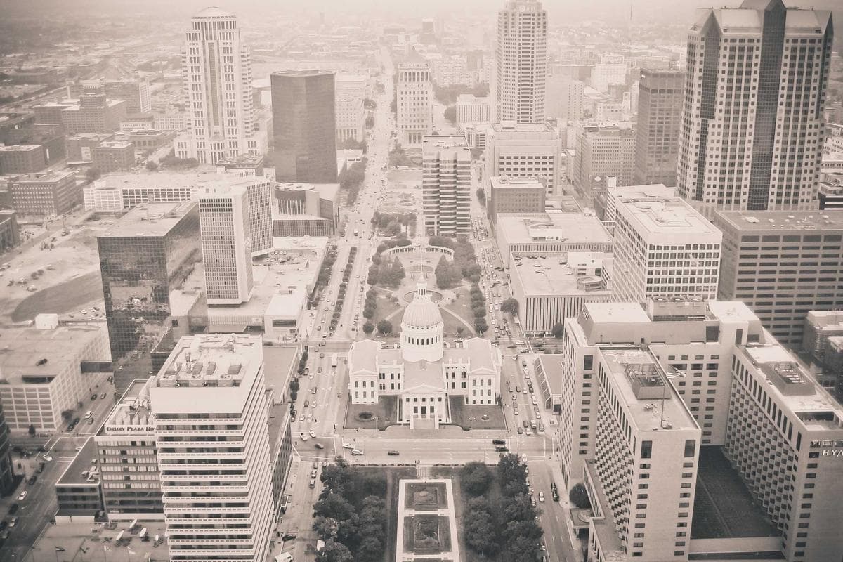 Black and white aerial view of a dense city grid